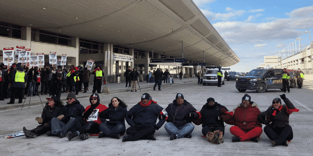 Rashida Tlaib Briefly Detained After Joining Protest at Airport Over Low Wages