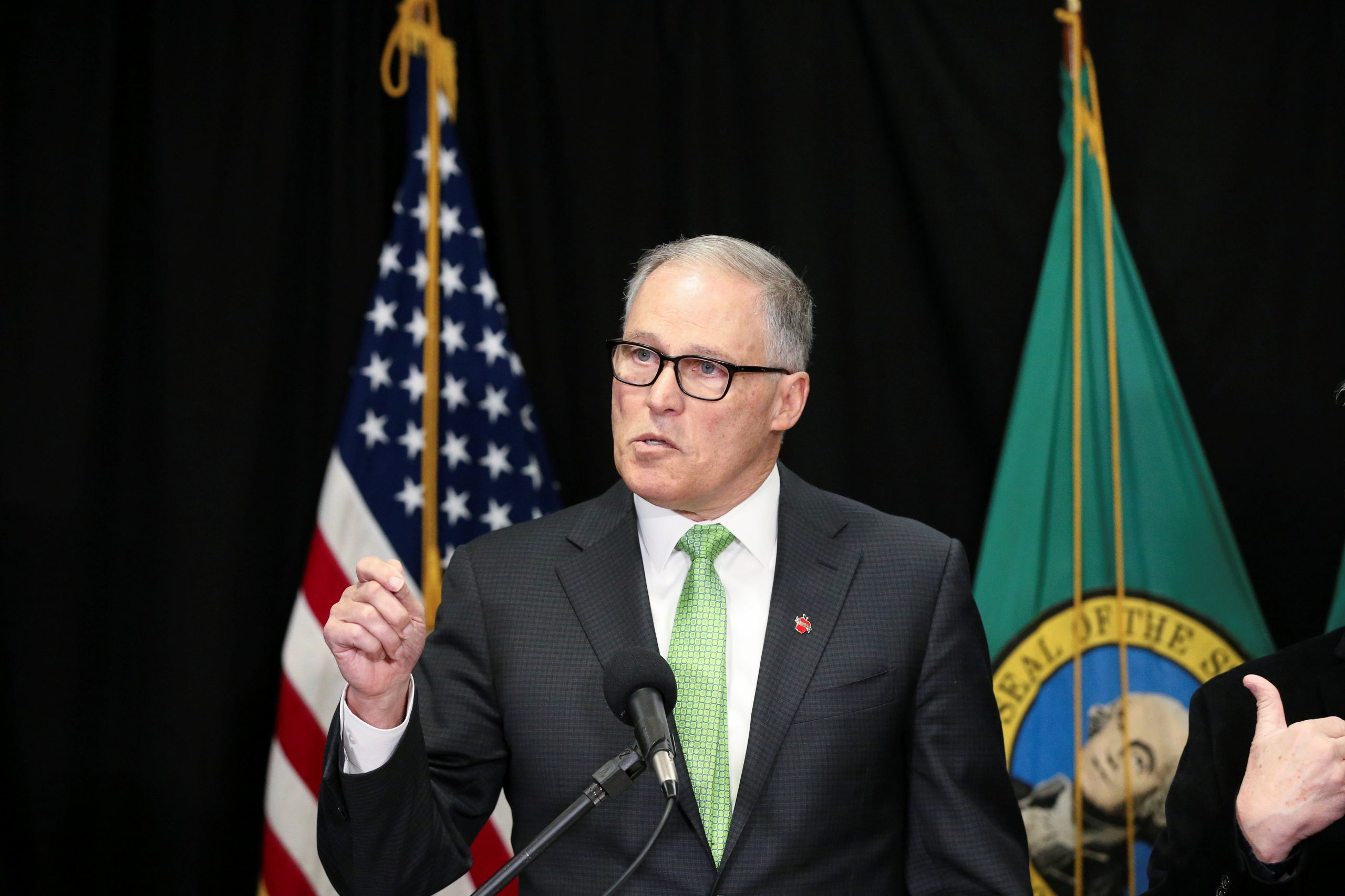 Washington Bans Gatherings, May Close Schools to Fight COVID-19; Lockdowns Possible