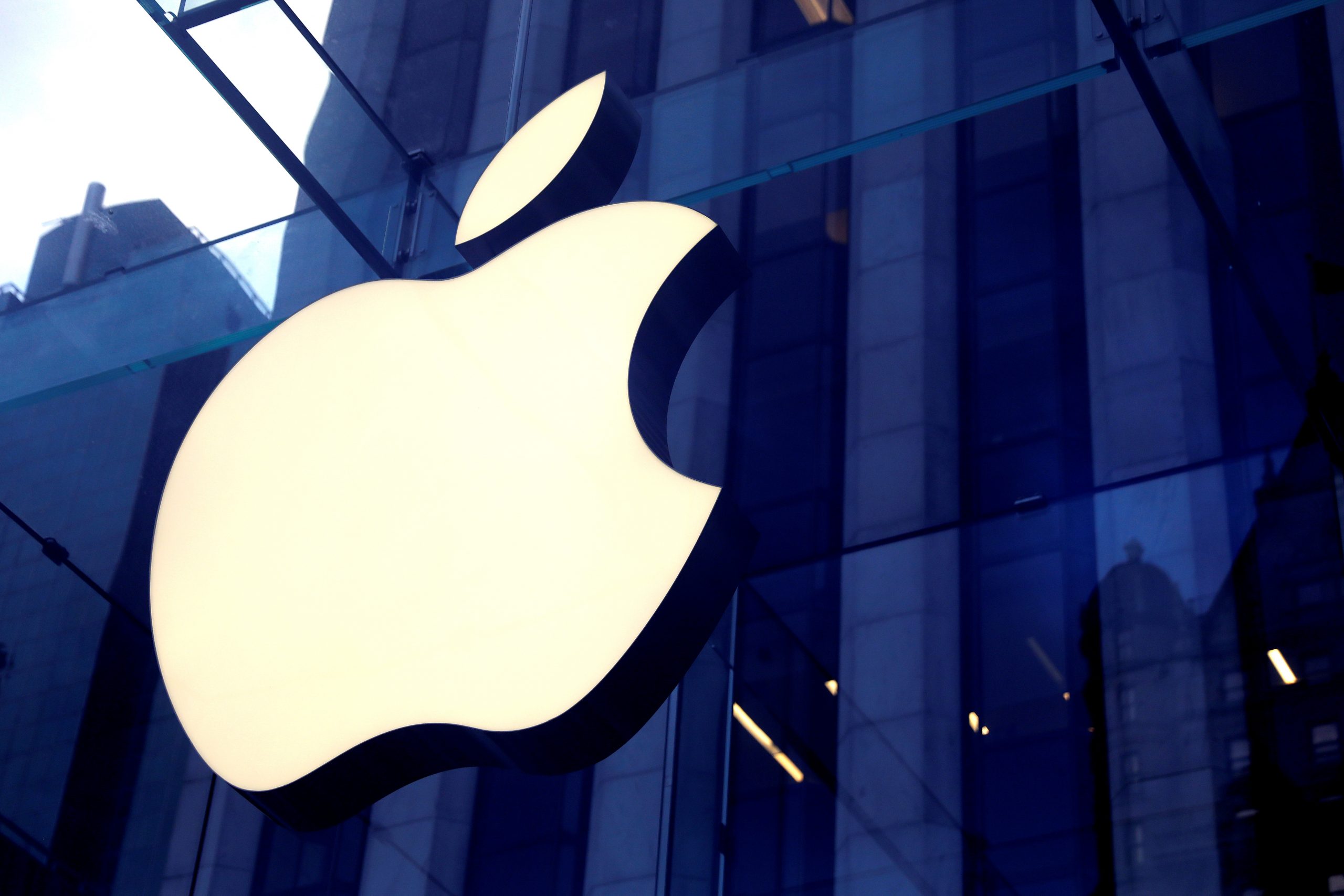 FILE PHOTO: The Apple Inc. logo is seen hanging at the entrance to the Apple store on 5th Avenue in Manhattan, New York, U.S., October 16, 2019. (Mike Segar/Reuters)