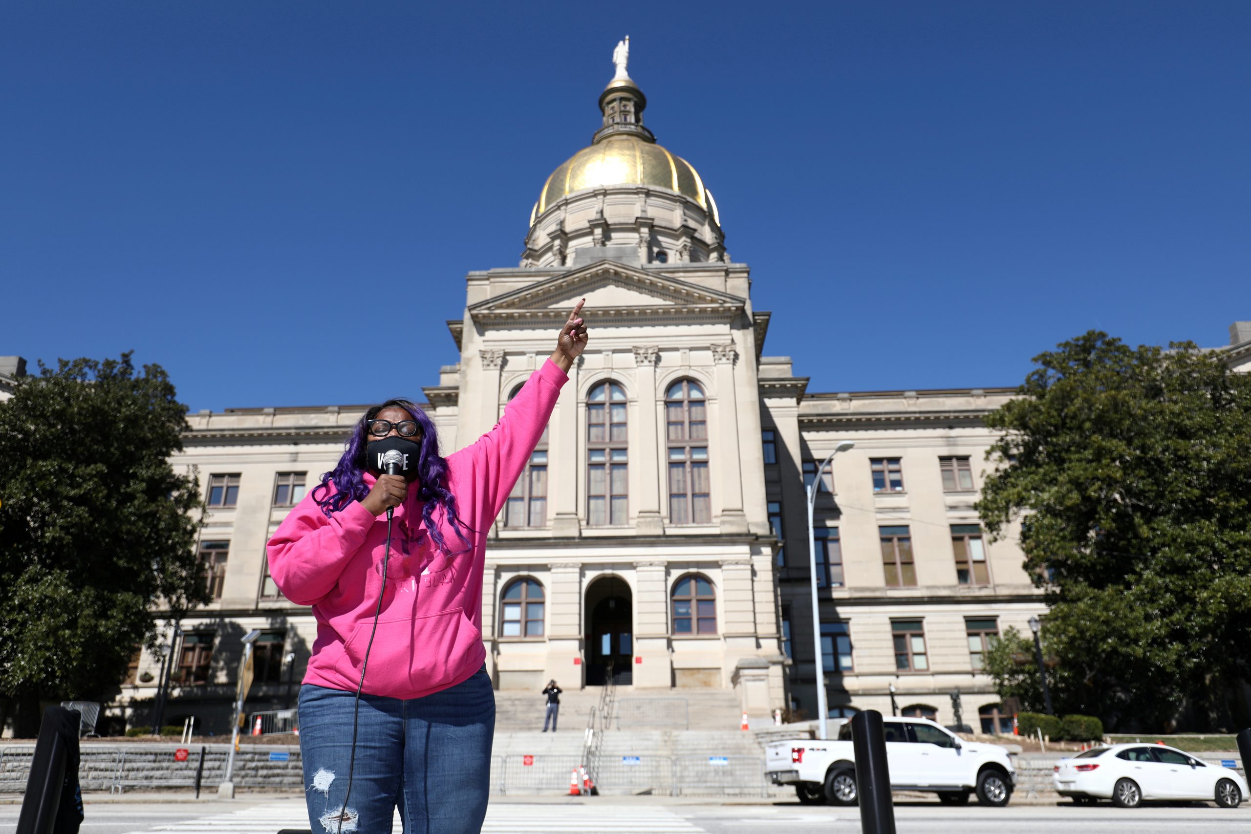 Georgia Bans Giving Water To Voters in Line Under Sweeping Restrictions