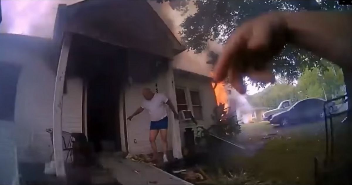 As House Fire Explodes Around Him, Heroic Police Officer Rushes in to Save Woman Trapped Inside