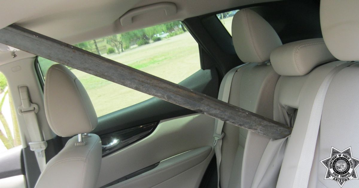Woman Inches from Being Impaled When Metal Pole Flies Through Windshield on Highway