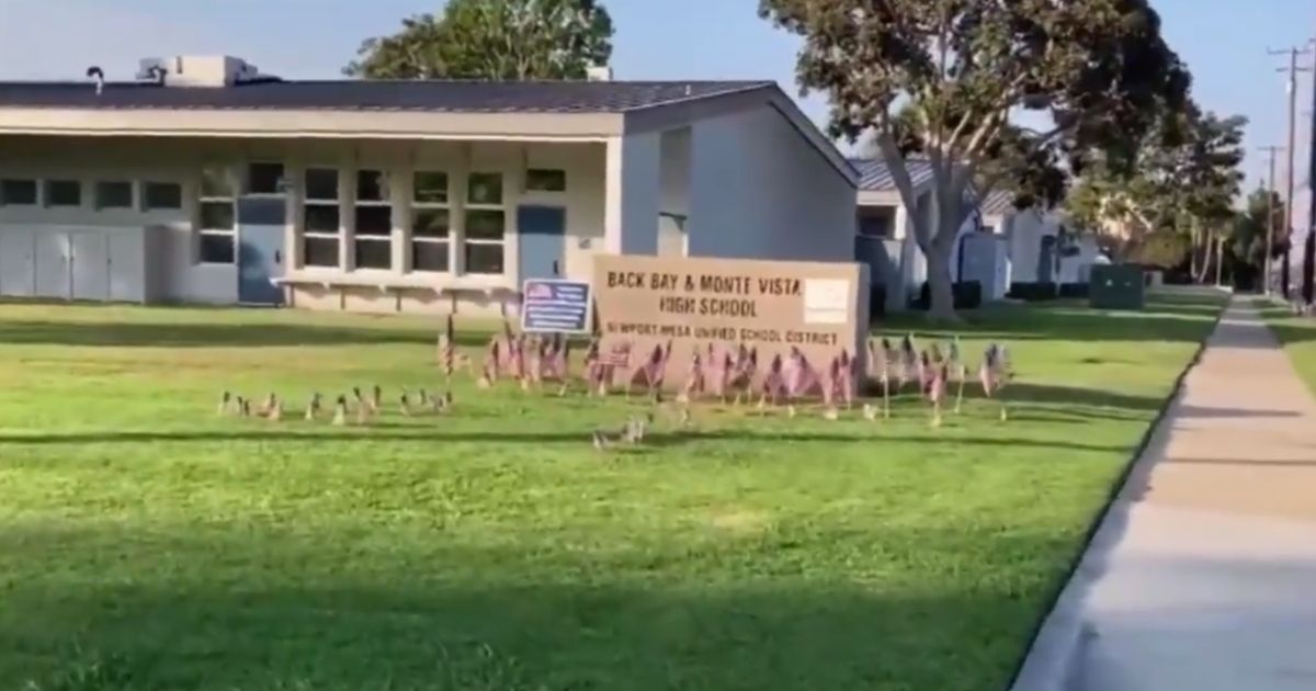 Teacher Who Rejected US Flag Faces Fury as Parents Roll Up To School Grounds With Red, White and Blue
