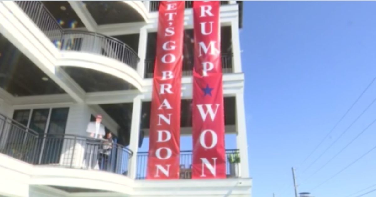 Man Already in Trouble for ‘Trump Won’ Banner Doubles Down, Unfurls ‘Let’s Go Brandon’ Right Next to It