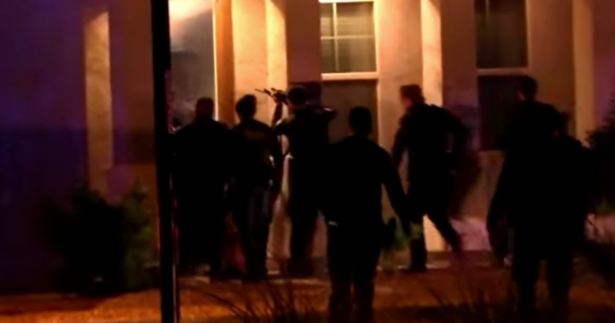 Officers Ambushed as They Attempt to Rescue Infant during Armed Standoff: Nine Officers Injured