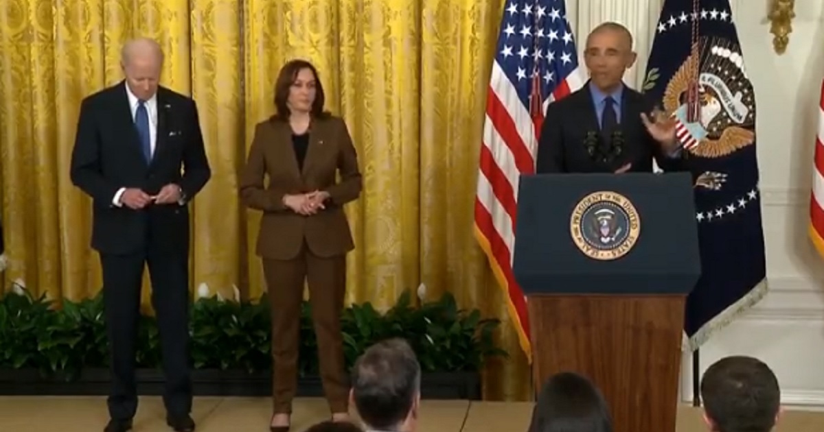Watch the Bizarre Moment Biden Pulls Something Out of His Pocket and Eats It During Middle of Obama Speech