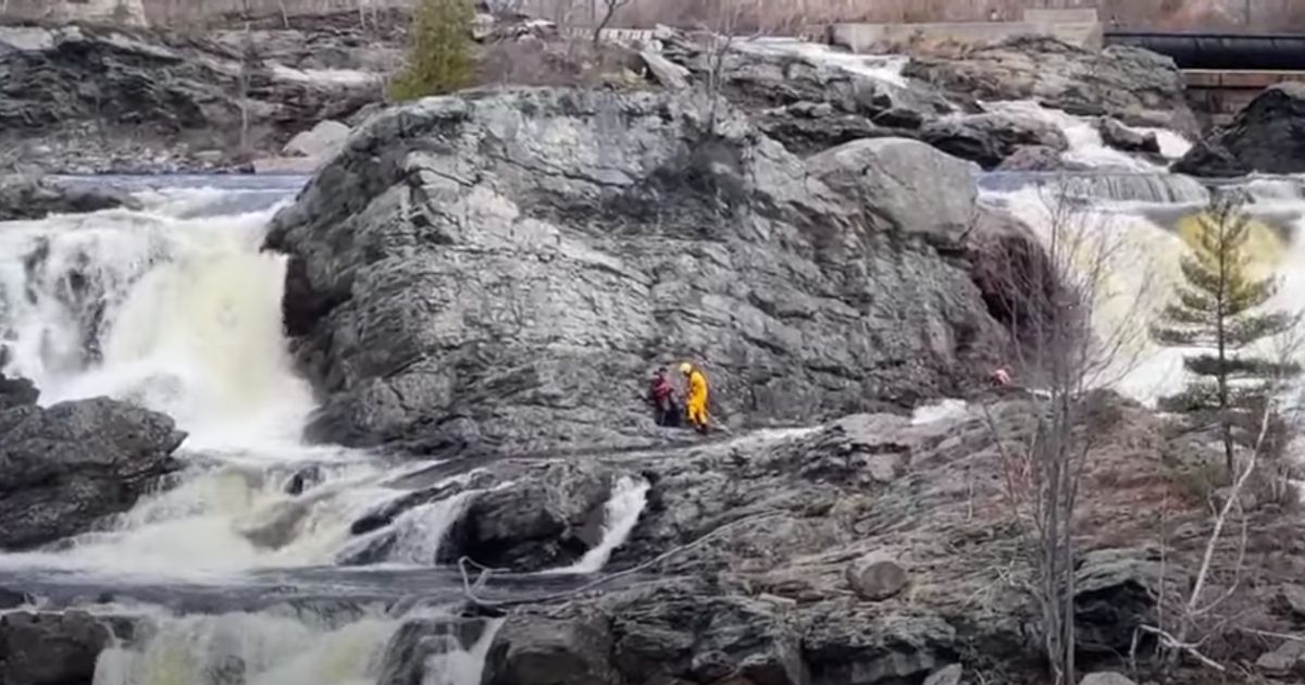 Man Crossing Waterfall Sets Off Major Rescue Effort After Water Rises, Trapping Him on Rocks