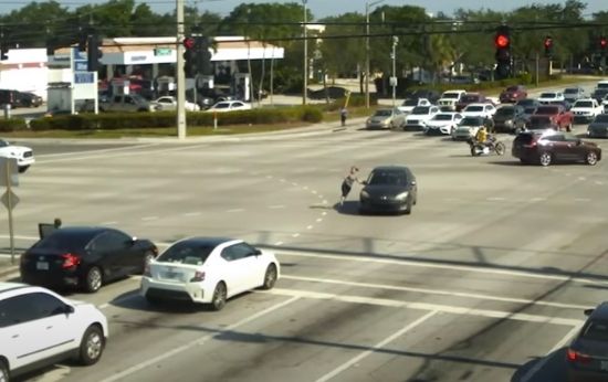 Video: ‘Good Samaritans’ Step In to Stop Car Crossing Intersection After Driver Suffers ‘Medical Episode’