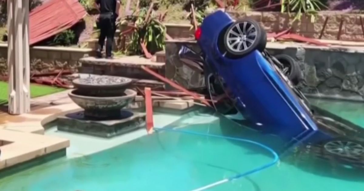 Man Saves Woman After BMW Crashes Through Fence, Lands Upside-Down in Pool: 'Not a Great Pool Toy'