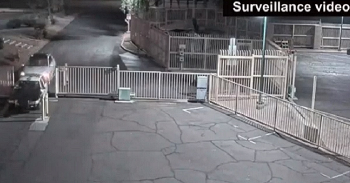Watch: Officer Rolls Out of Moving Vehicle, Draws Weapon and Hits Target After Being Rammed Forward
