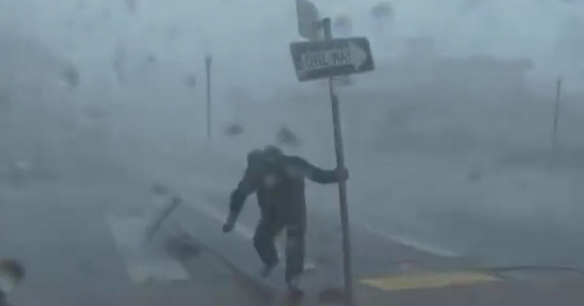 Weather Channel Reporter Gets Slammed by Flying Tree Branch During Intense Hurricane Ian Live Shot
