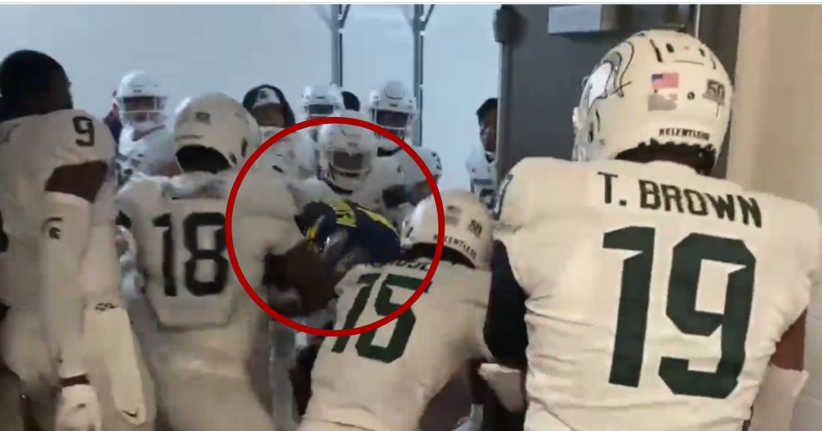 Watch: Player from Winning College Football Team Savaged by Opponents in Post-Game Tunnel Attack