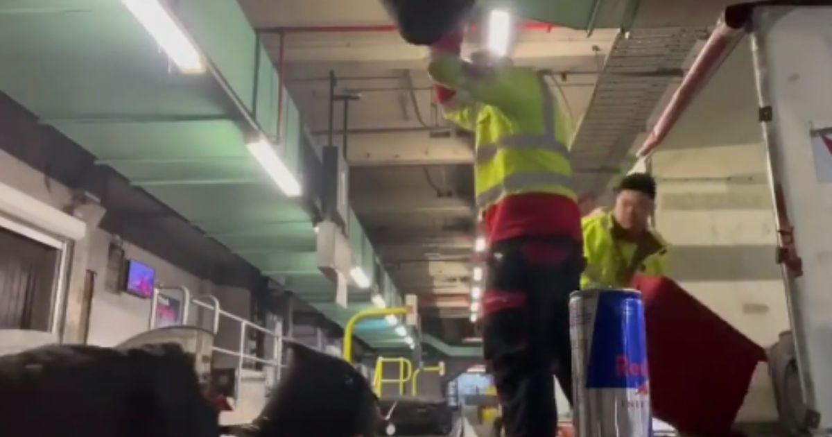Two baggage handlers at Melbourne Airport were fired after getting caught slamming bags onto a conveyor belt.