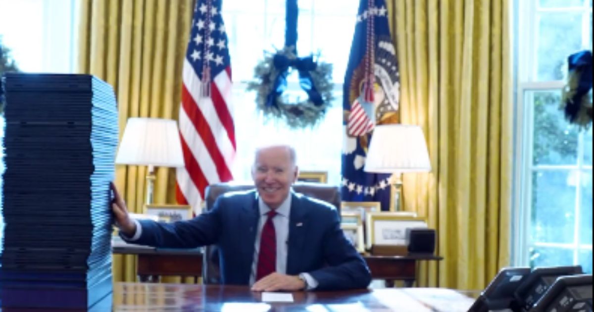 President Joe Biden signs 65 bills.