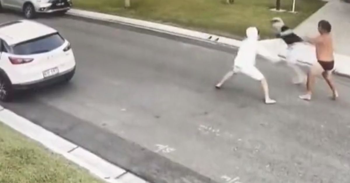 An Australian man fights off would-be thieves in this video screen shot.