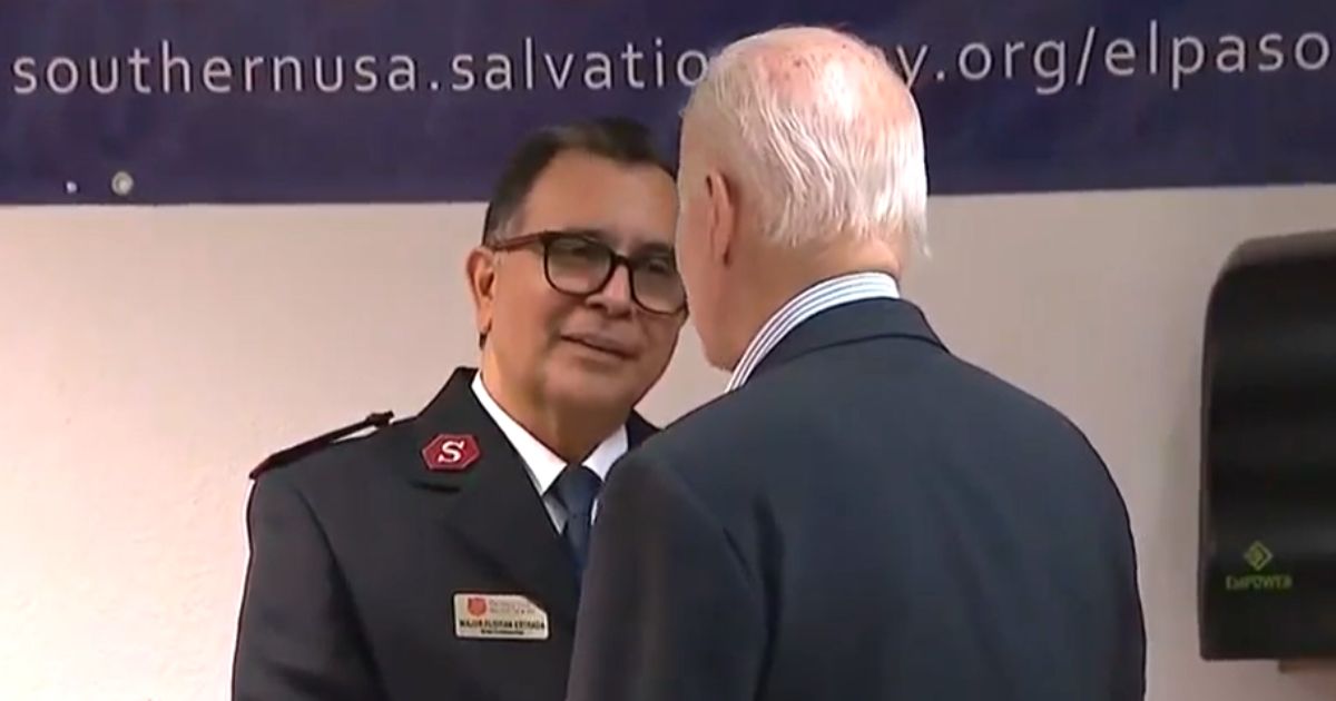 President Joe Biden greets a Salvation Army officer at a migrant services center in El Paso, Texas, on Sunday.
