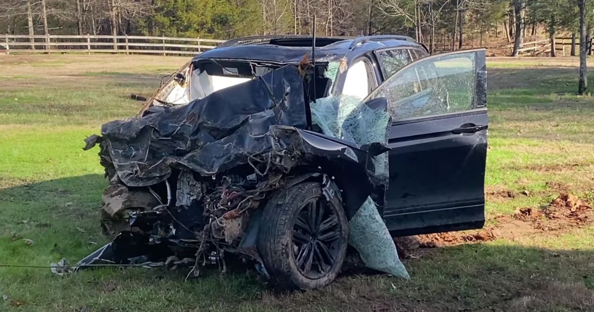 The crash sent the driver --and car parts -- flying through the yard.