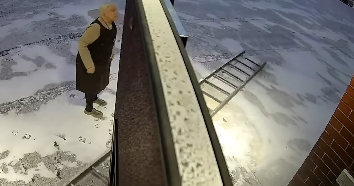 A nun thwarts two would-be thieves by ripping down their ladder.