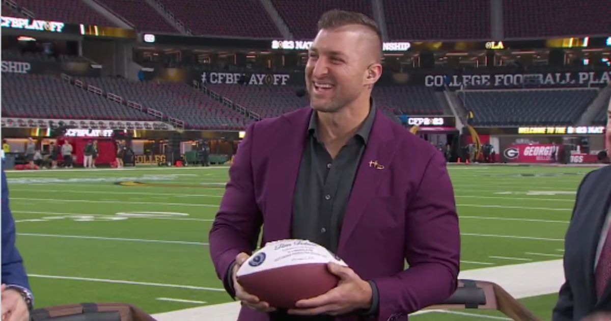 Tim Tebow's fellow on-air ESPN personalities surprised him before Monday's college football national championship game with the announcement that he had been accepted into the College Football Hall of Fame.