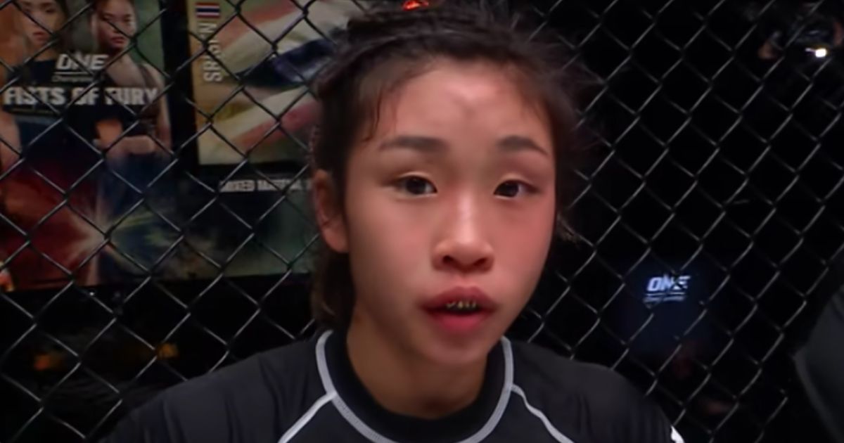 Victoria Lee celebrates after winning her first ONE MMA fight against Sunisa Srisan in February 2021.