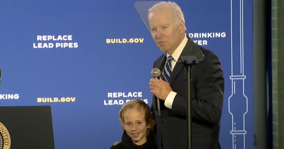 President Joe Biden pulled a little girl from the audience up on stage before his speech Friday.