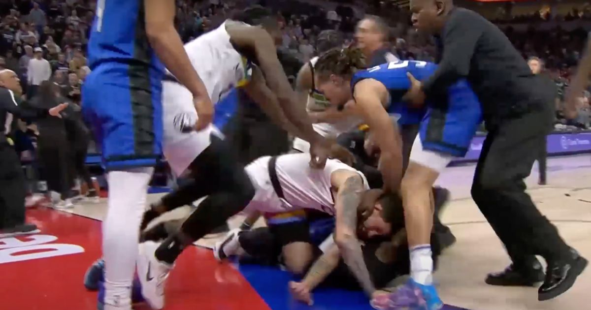 A confrontation between two players led to an all-out brawl breaking out in Minneapolis Friday night.