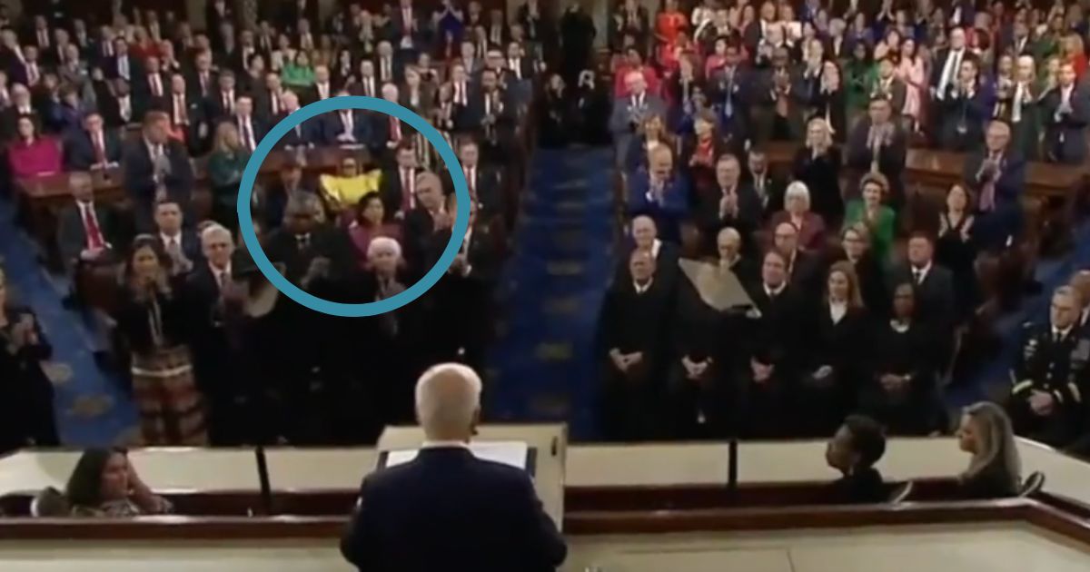 During Tuesday's State of the Union address, Sen. Kyrsten Sinema was caught on her phone instead of paying attention to President Joe Biden.