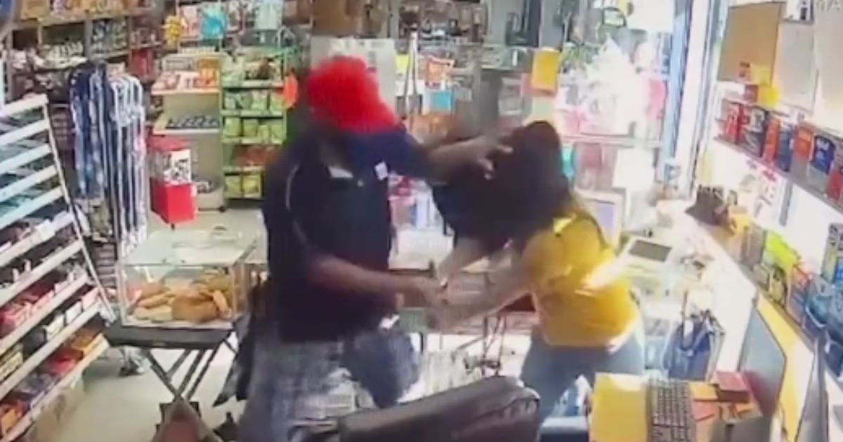 A security camera shows a clerk defending herself after being attacked in Los Angeles.