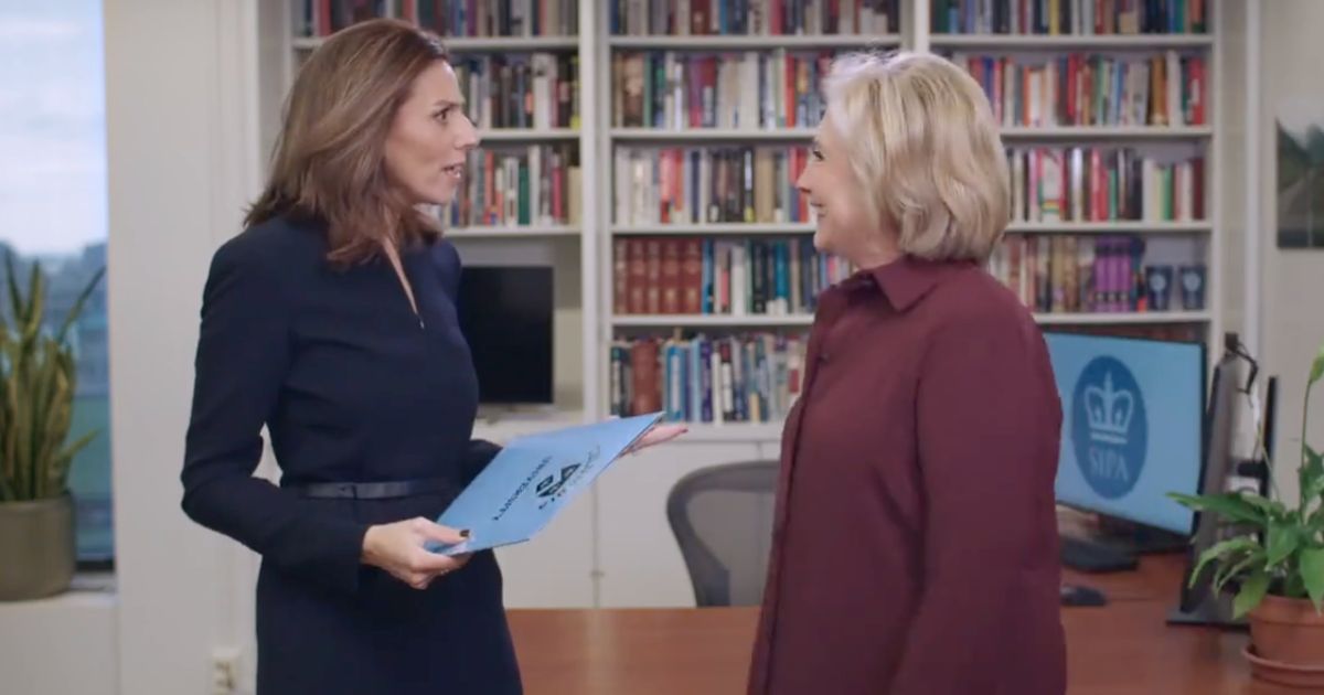 Columbia Univeristy Dean Keren YarhiMilo, left, and former Secretary of State Hillary Clinton act in a skit about a new class they will teach at Columbia University this fall.