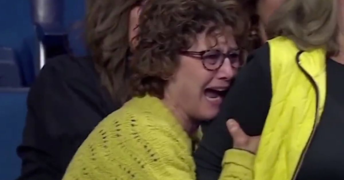 The mother of Iowa wrestler Spencer Lee was visibly distraught after Lee lost on Friday, but her tears quickly turned to frustration.