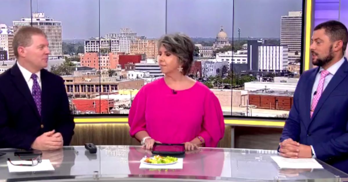 Mississippi news anchor Barbie Bassett, middle, has not been on air since she made a reference to a Snoop Dogg quote.