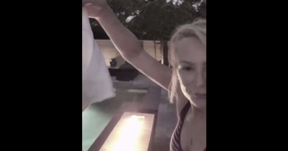 "Chatterbox Mama" burns her Nike sports bra in protest.