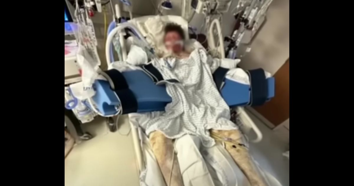 This YouTube screen shot shows Mason Dark, 16, who was hurt in a 'flame-thrower' incident, recovering at a hospital.