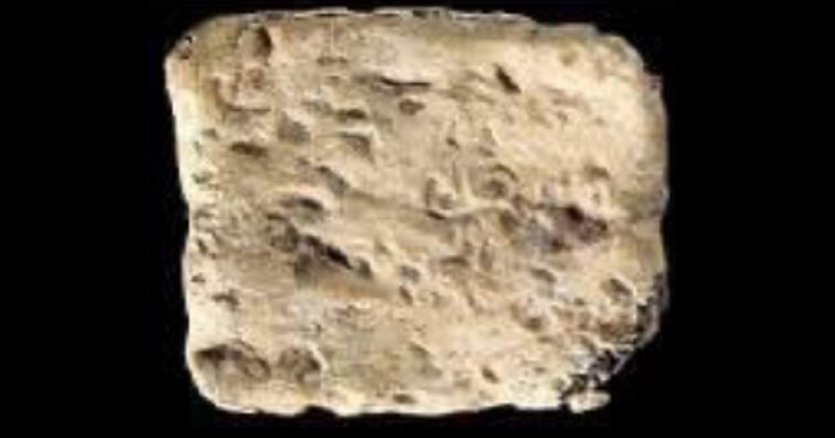 A tiny "curse tablet" found in an archaeological excavation in Israel.