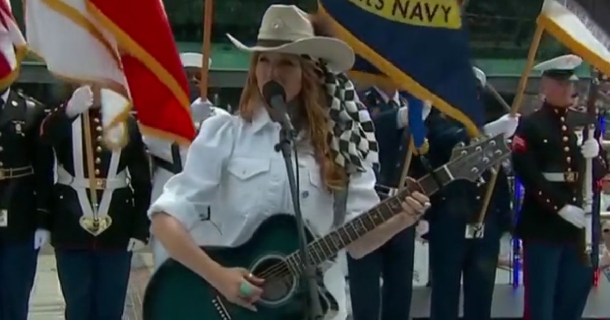Jewel performs "The Star-Spangled Banner" Sunday at the Indy 500 in Indiana.