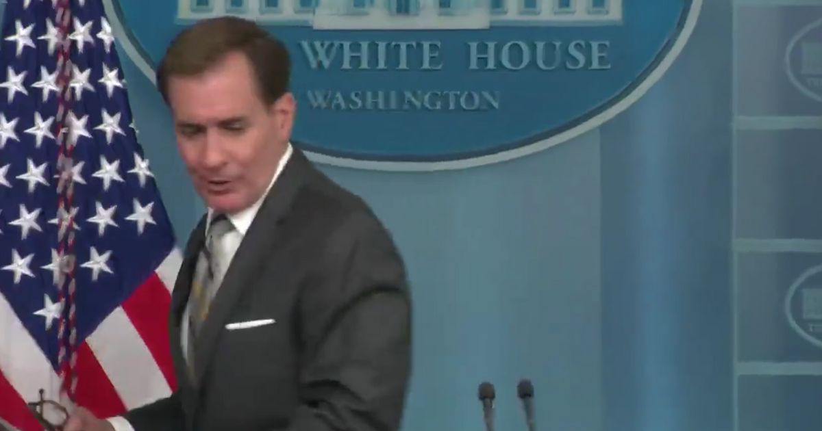 National Security Council spokesman John Kirby walks away from the White House briefing room podium after reporters persist in asking about Hunter Biden's actions and what Joe Bide