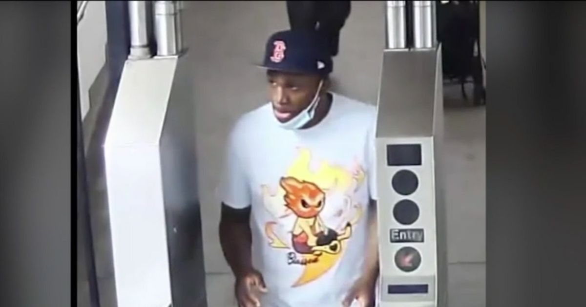 a video surveillance still showing a man suspected of slashing the legs of three women