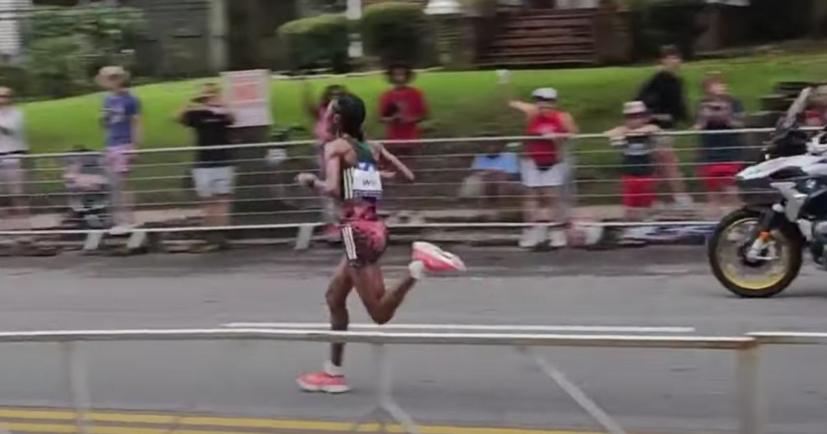 Senbere Teferi is seen running during the Peachtree Road Race in Atlanta on Tuesday.