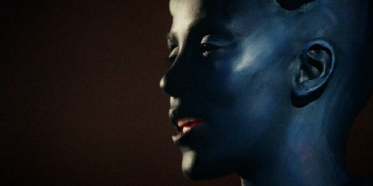 Singer Doja Cat appears in the video for the song "Paint the Town."
