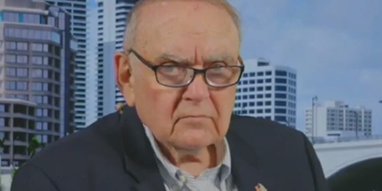 Business billioniare Leon Cooperman glowers while being interviewed by Fox Business host Liz Claman on Wednesday. (Claman is not pictured.)