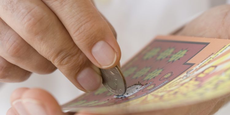 Woman Wins $3 Million on Scratch Off, Plans to Take Terminally Ill Husband on Dream Vacation