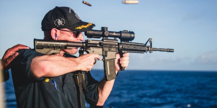 An Instagram photo posted by the U.S. Navy drew barbs on social media for its "backward" rifle" image.