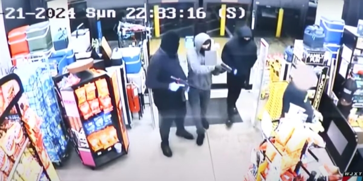 Three of the suspects would force an employee to open the safe, while a fourth waited in a getaway car, sheriff's investigators said.