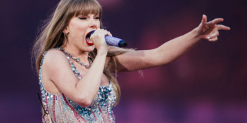 Watch: Taylor Swift Fans Lose It After Man Falls Asleep During Her Concert – ‘You Deserve Prison’
