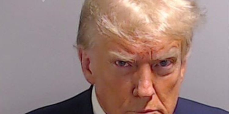 Trump Claims He Was ‘Tortured’ in Jail in Campaign Email; Selling Mugs with Mug Shot