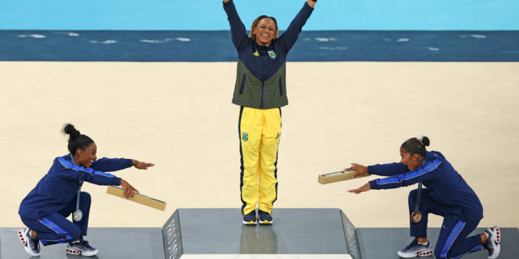 Biles, Chiles Bow to Gold Medalist Rebeca Andrade on Award Podium