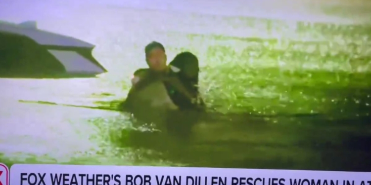 Fox Weatherman Breaks from Reporting to Save Woman From Car During Flood