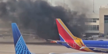 Breaking: American Airlines Plane on Fire At Denver Airport