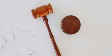 Judge Downplays Communications With Climate Activists While His Testimonial Tops Their Website